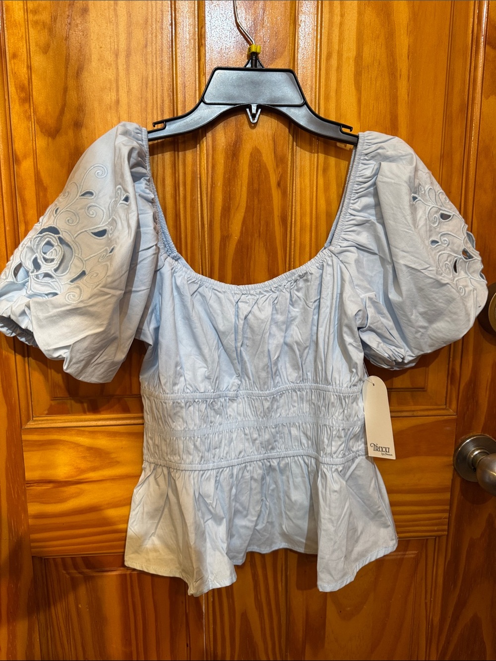 Smocked Puff Sleeve Peplum Blouse in Light Blue - Unbranded